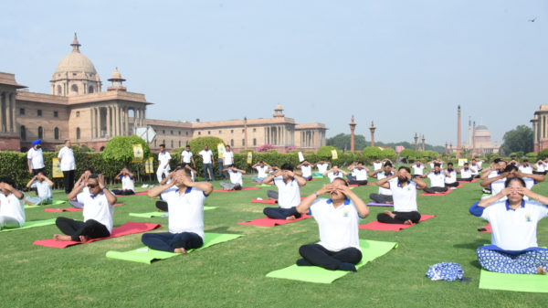The Minister of State for Development of North Eastern Region (I/C), Prime Ministers Office, Personnel, Public Grievances & Pensions, Atomic Energy and Space, Dr. Jitendra Singh performing Yoga, on the occasion of the 5th International Day of Yoga 2019, organised by the Department of Pension and Pensioners Welfare, Ministry of Personnel, Public Grievances and Pensions, at North Block, in New Delhi on June 21, 2019. The Secretary, DoPT, Dr. C. Chandramouli is also seen.