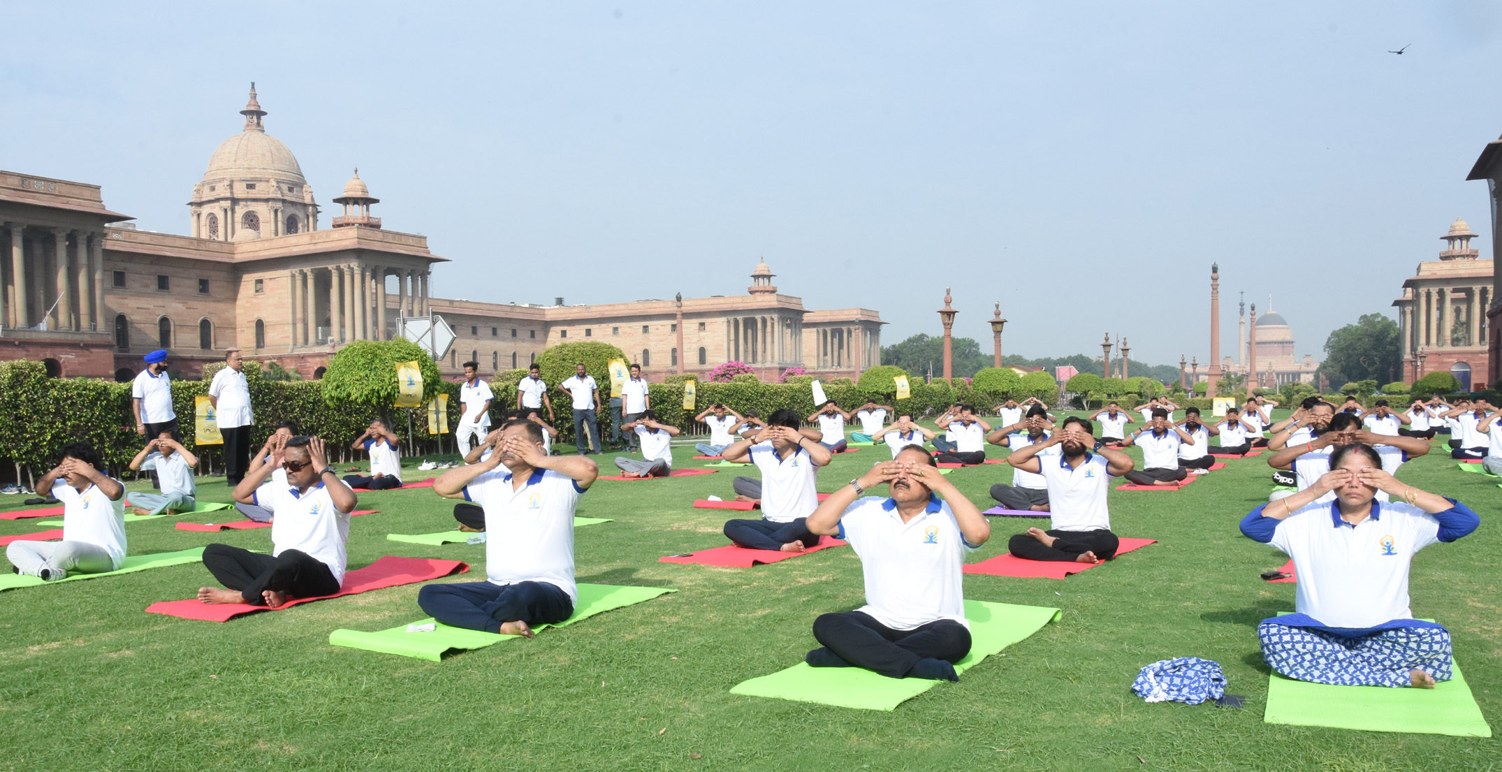 The Minister of State for Development of North Eastern Region (I/C), Prime Ministers Office, Personnel, Public Grievances & Pensions, Atomic Energy and Space, Dr. Jitendra Singh performing Yoga, on the occasion of the 5th International Day of Yoga 2019, organised by the Department of Pension and Pensioners Welfare, Ministry of Personnel, Public Grievances and Pensions, at North Block, in New Delhi on June 21, 2019. The Secretary, DoPT, Dr. C. Chandramouli is also seen.